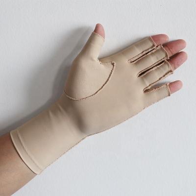 China Nylon Anti Arthritis Fingerless Compression Gloves Soft And Smooth Edema Control for sale