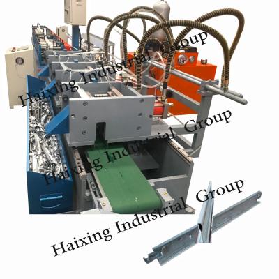 China Building Material Stores Steel Keel Roll Forming Light Steel Ceiling Tiles Keel Frame Metal Light Keel Machine for sale