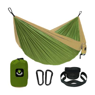 China Hammocks are camping hammock foldable double and single portable hammocks with 2 tree straps, lightweight nylon parachute hammocks for hanging out for sale