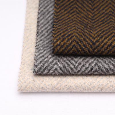 China Stretch Fishbone Jacquard Merino Wool Polyester Blended Knitting Fabric For Winter Suit Coat Pants for sale