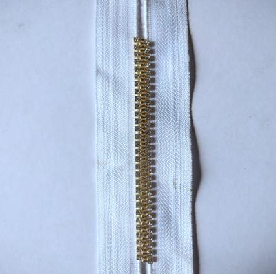 China Patent New Arrival Fancy Golden Zipper In Piece Auto Lock Pantone Nylon Zipper Color Cheap Zippers For Garment Production for sale