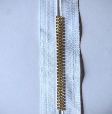 China Golden Nylon Patent Shorts Open Closed Zipper Sewing Mesh Tape Invisible Zipper Diamond-Zipper for sale