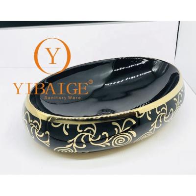 China Modern Golden pattern Handmade China Lavabo Washbasin bathroom sink bowl countertop oval Shape Ceramic wash basin black bathroom sink for sale