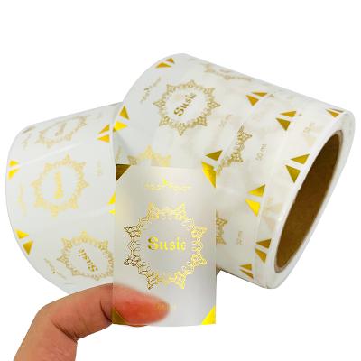 China Cheap Printing Custom Sticker Waterproof Transparent Gold Foil Low Moq Adhesive For Logo Box for sale