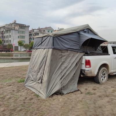 China Hot Sale Camouflage Game Camping Truck Roof Top Tent Foldable /Canvas /Field Shell Car Soft Top Roof Tent Cover Top Tent For Sale for sale