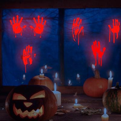 China Handprints Blood Footprints Bloodstains Wall Stickers Holiday Luminous Window Decoration Window Sticker Halloween Glow Fluorescent Sticker for sale