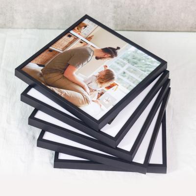 China Environmentally friendly wholesale plastic picture frames hanging family photo frame highlight DIY photo frame product for sale