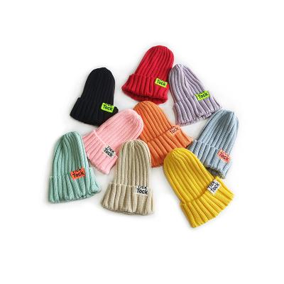 China Pure COMMON Girls Beanie Hat Boys Baby Kids Knitted Winter Hat Wholesale Fashion Color Kids Knit Hats for sale