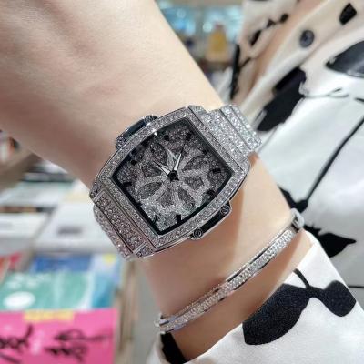 China Automatic Date Ice Watch Luxury Rhinestones Hollow Out Stainless Steel Fashion Wrist Watch Waterproof Watch Women for sale