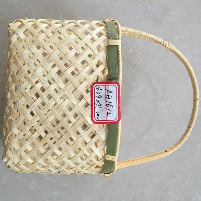 China Sustainable Storage Basket Cheap Wooden Bamboo Basket With Handle For Food Fruit for sale