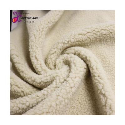 China Hot Sale Hot Selling Hoodies Plush Fleece 100% Polyester Knitted Winter Coat Sherpa Fleece Fabric Tear-Resistant for sale