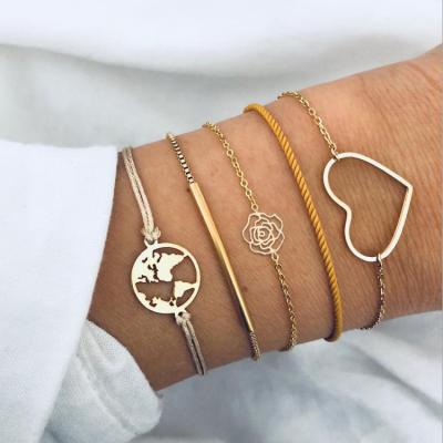 China TRENDY Simple Hollow Love Heart Rose Gold World Map Stackable Bangle Women Jewelry Bracelet for sale