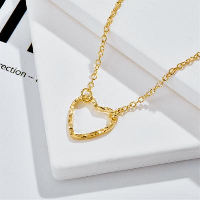 China Other New Design Real Copper Heart Necklace Hollow Love Heart Pendant Ladies Necklace 14k Gold Plated Couples Necklace for sale