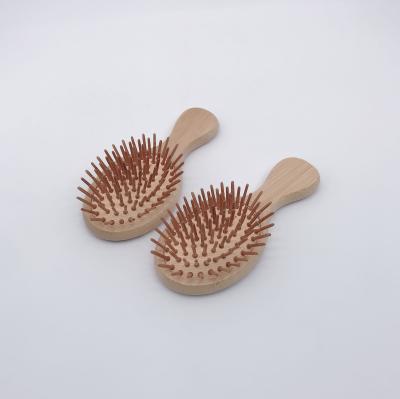 China Wholesale Compact Anti Static Massage Bamboo Hair Scalp Combs Wooden Straightener Detangling Hair Brush for sale