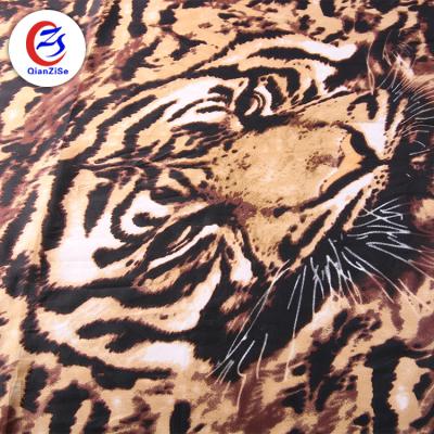 China Anti-static Hot Sale Tiger Silk Fabrics Dubai Satin Digital Printed Silk Printed Fabric for sale