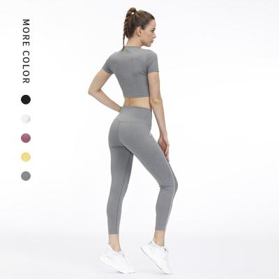 China Brand new high-waisted brand logo autumn and winter reflective nude yoga suit QUICK DRY running fitness suit for sale