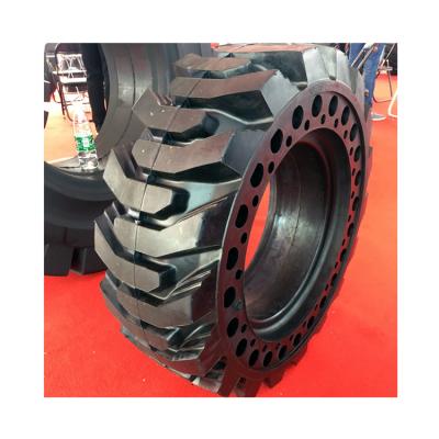 China Natural Rubber Solid Skidsteer Tread 10-16.5 12-16.5 Backhoe Loader Tires On Rims 10x16.5 12x16.5 for sale