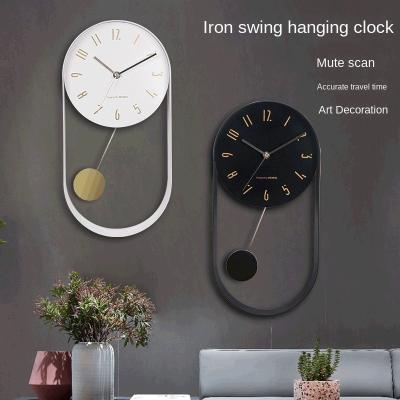 China Wholesale Simple Wrought Iron Wall Clock Living Room Wall Clock Metal BRIEF Iron 16Inch Swing Clock Modern Creative Style Clock for sale