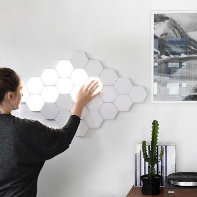 China Hot Selling Minimalist Product RGB Touch Control Magnetic Honeycomb Led Night Light Sensitive Led Wall Lamp for sale