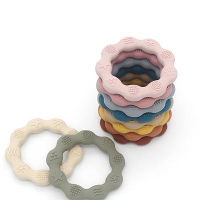 China Wholesale soft solid wooden toys bpa free silicone teether Hot Toy Rabbit sun star shape silicone baby donut teether solid wood tie baby teethers for sale