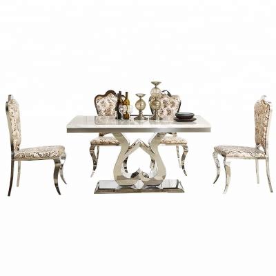 China Modern Furniture Stainless Steel Dining Table With 4 Chairs Heart Shape D2 for sale