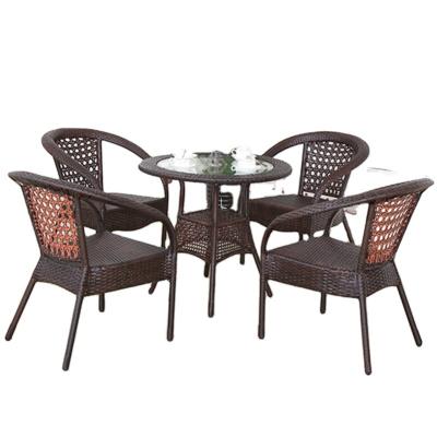 China Modern Outdoor Furniture Rattan Chair Nordic Rattan Garden Chair 5 Piece Set Balcony Table Chair Leisure Modern Creative Furniture Z349 for sale