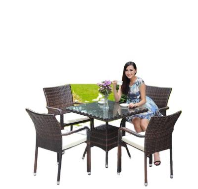 China Modern Outdoor Furniture Rattan Chair Nordic Rattan Garden Chair 5 Piece Set Balcony Table Chair Leisure Furniture Modern Creative Z353 for sale