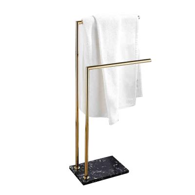 China Fashion New Brushed Gold Bath Towel Rack Stand Up Free Standing Household Bathroom Stainless Steel Towel Racks for sale