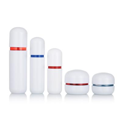 China Cosmetic White Jar Skin Care Packaging Cosmetic Set Airless Cosmetic Bottles for sale