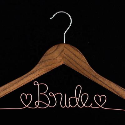 China Perfect Eco-Friendly Solid Wood Wedding Bride Hanger Keepsake Gift Hanger with Art Words for Wedding Party Any Occasion Matches Wedding-Dress Style for sale