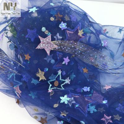 China Nanyee Sustainable Textile Long Tail Tulle Lace Sequin Iridescent Fabric for sale