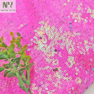 China Nanyee Textile Full Cover Breathable Fuchsia Sequin Lycra Iridescent Fabric for sale