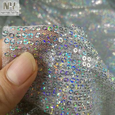 China Nanyee Textile Low Price Common 3mm Hologram Fluorescent Silver Sequin Fabric for sale