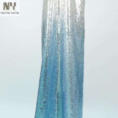 China Nanyee Sequin Textile 3mm Ombre Fluorescent Blue Silver Gradient Color Changing Fabric for sale