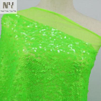 China Light Green And Customized Sequin Nanyee Fluorescent Textile Fabric for sale