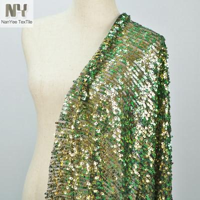 China Nanyee Textile Special Type 9mm Hollowed Seed Sequin Fluorescent Fabric for sale