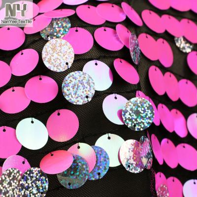 China Nanyee Textile 18MM Backing Fluorescent Hologram Front Roseberry Fluorescent Sequin Fabric for sale