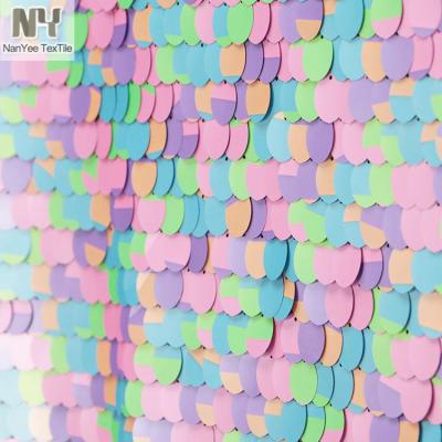 China Nanyee Fluorescent Textile 18mm Spaced Smoothy Candy Color Dyed Sequin Fabric for sale