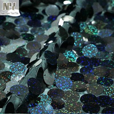 China Nanyee Fluorescent Textile Wholesale Double Stitched 18mm Black Hologram Sequin Fabric for sale