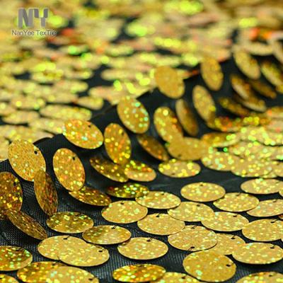 China Nanyee Fluorescent Textile Specialized In Circle Gold 18mm Sequin Fabric for sale