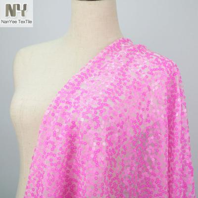 China Nanyee Textile Fluorescent Neon Pink Flower Shaped Sequin Fabric for sale