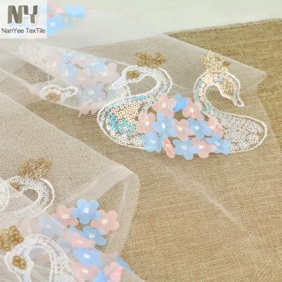 China New Nanyee Breathable Textile 3D Applique With Sequin Swan Embroidery Fabric On Tulle for sale