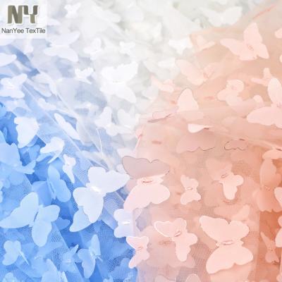 China Nanyee Breathable Textile In Stock Butterflies Tulle Backing 3d Laser Embroidery Fabric for sale