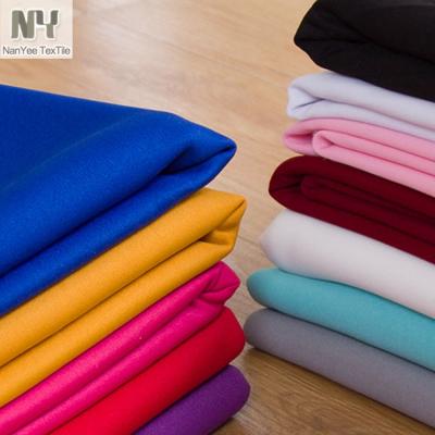 China Nanyee Fluorescent Textile Knitted Polyester Stretch Solid Dyed Scuba Fabric for sale