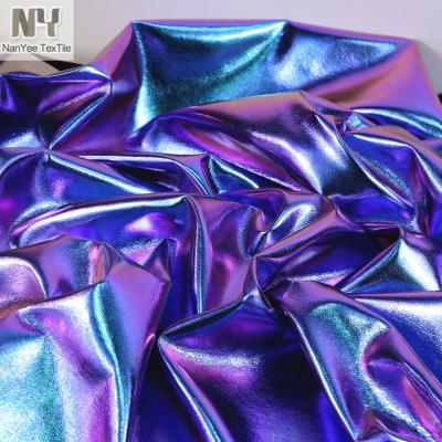 China Nanyee Textile 0.6mm Thickness Waterproof Purple Iridescent PU Foiling Fabric With Viscous Backing for sale