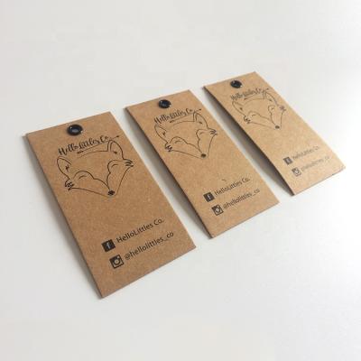 China Custom Luxury Cardboard Sustainable Designing Custom Printing Clothing Paper Swing Card Hangtag for sale