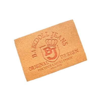 China Sewing on Logo Garment Leather Patch Custom personalized embossed jeans leather patch label for clothing with your own logo for sale