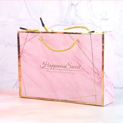 China Handmade China Manufactures White Luxury Small Carrier Wedding Logo Printed Paper Gift Bag Custom Made With Handle for sale