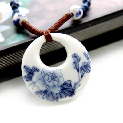 China Wholesale Handmade Custom White Blue Twist Necklace Leaf Necklace Ceramic Flower Pendant Choker for sale