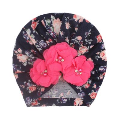 China 2021baby fashion verified supplies European and American children bend hat Indian knotted baby hat turban hat for sale